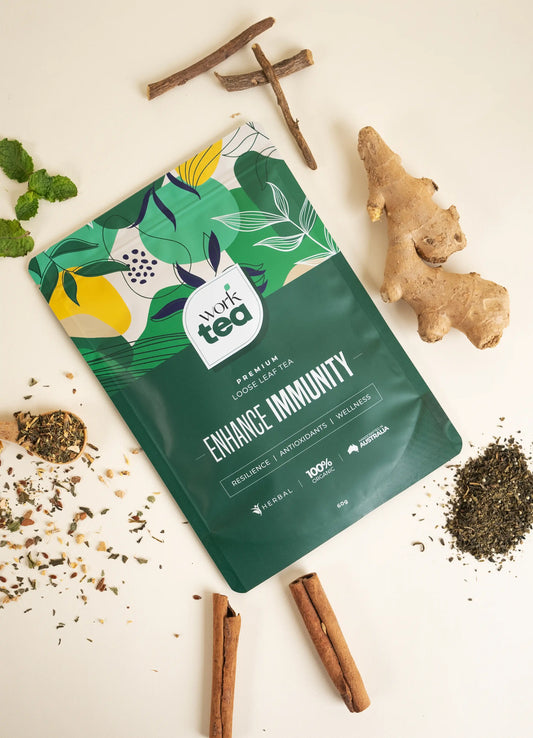 Tea package labeled 'Dark Tea' with immune-boosting ingredients on a light background