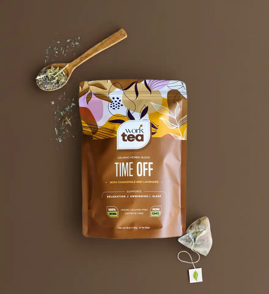 Work Tea 'Time Off' package with a spoonful of tea leaves on a brown background
